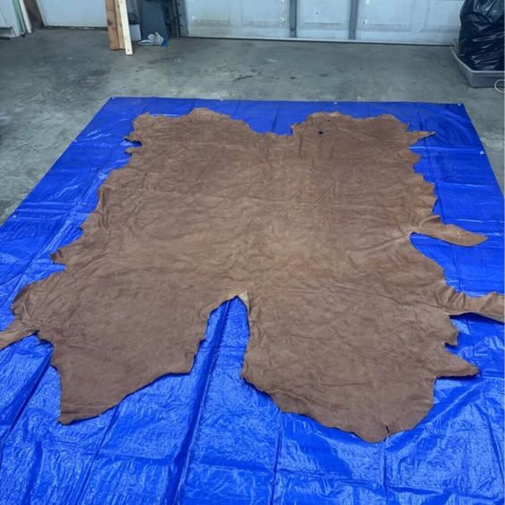 Tanned Cow Hide. Large brandy brown